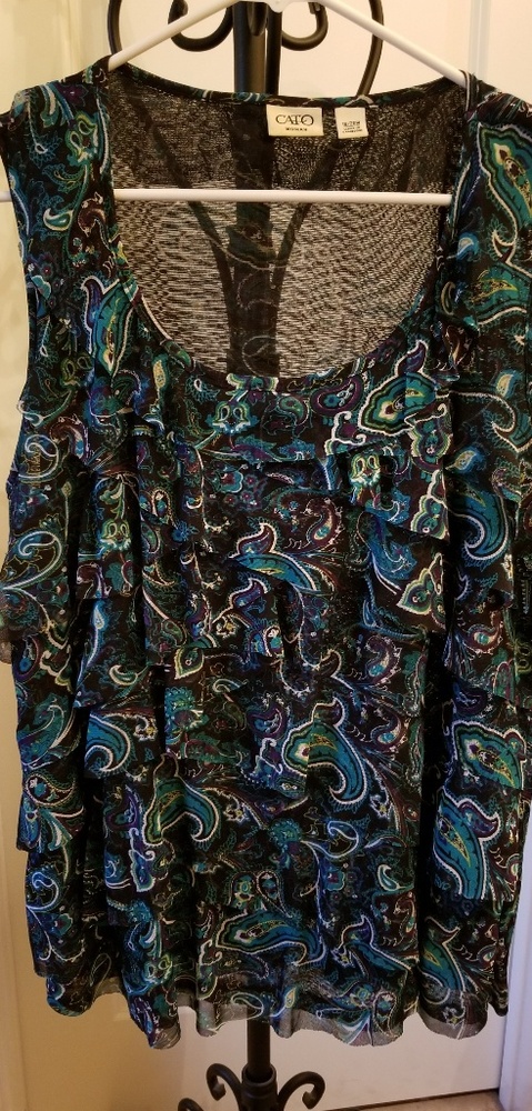 Sleeveless, multi-colored,paisley, ruffled blouse.